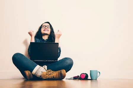happy laptop woman