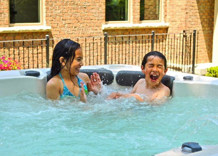 two girls in a hot tub